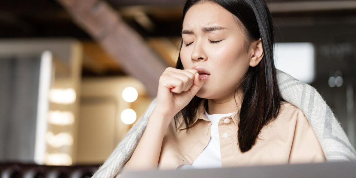 asian woman being ill coughing 2032 3148 1764578040.jpg